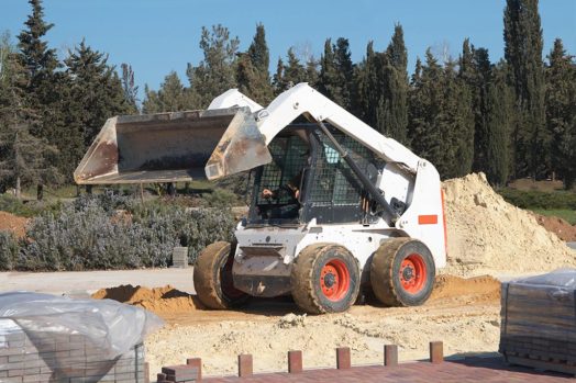 Bobcat loader of Bruce Hodgins Excavation for our commercial services